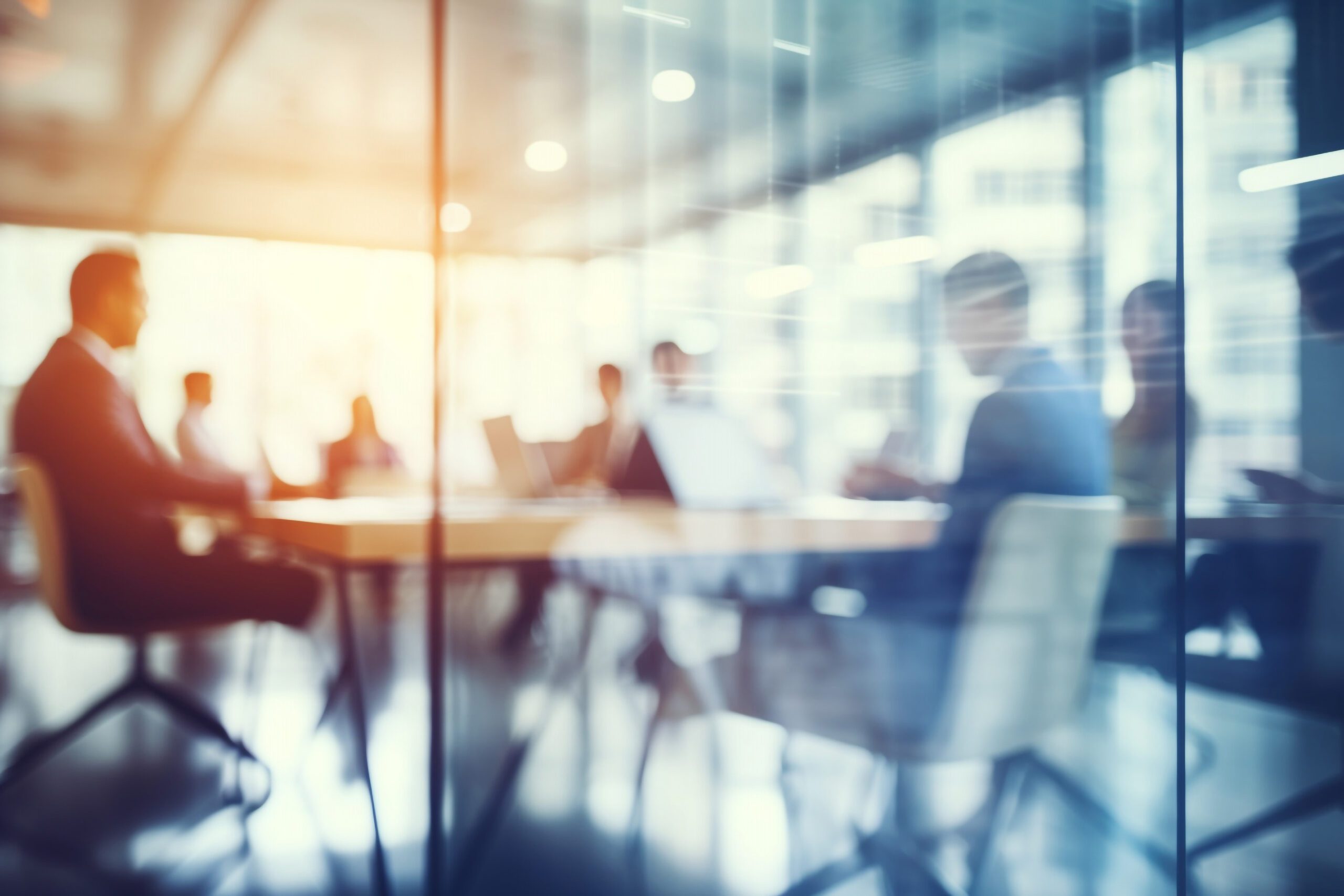 soft or blurred people at a board meeting. Corporate job. High q